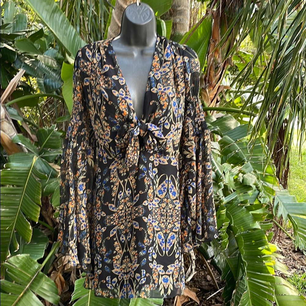bell sleeve, dark  floral and paisley dress with Thai front